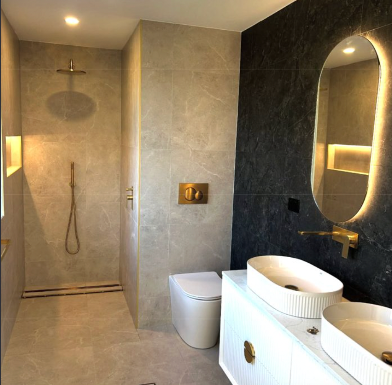Plumber Melbourne completing bathroom renovation plumbing for a shower and toilet